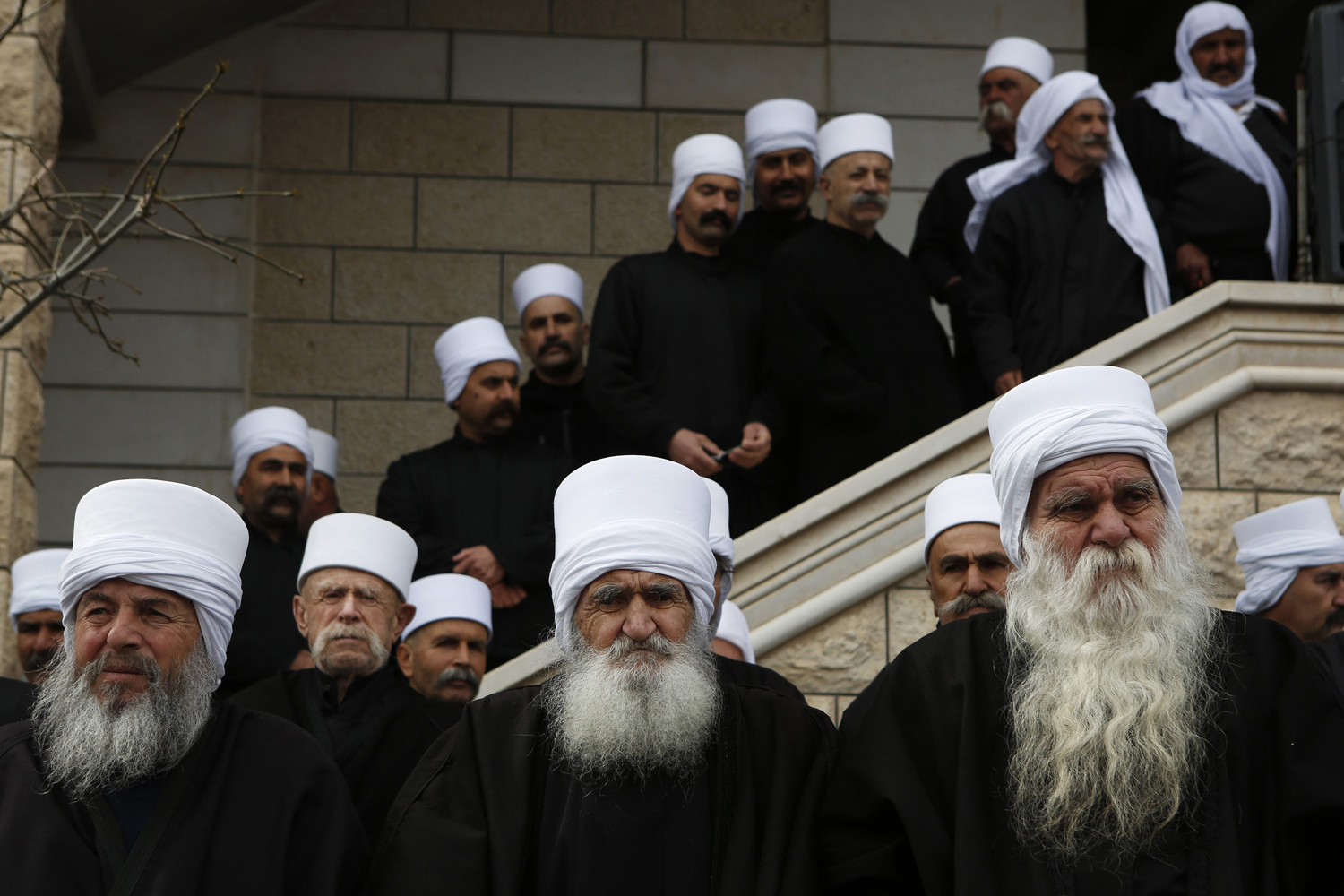 Members of the Druze community take part in a rally in the Druze village of Majdal Shams on the Golan Heights