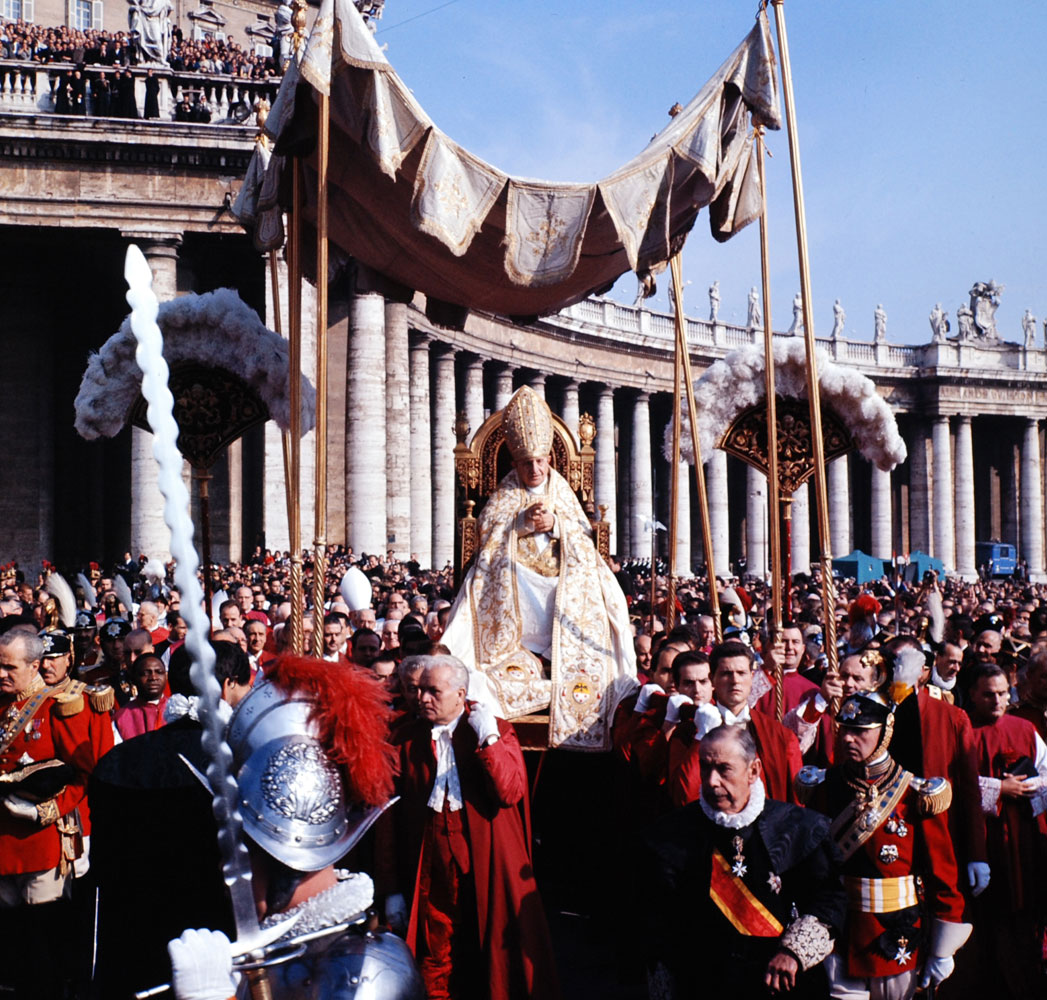 Pope John XXIII rides in the procession to St. Peter's Basilica at start of the Second Vatican Ecumenical Council, 1962.