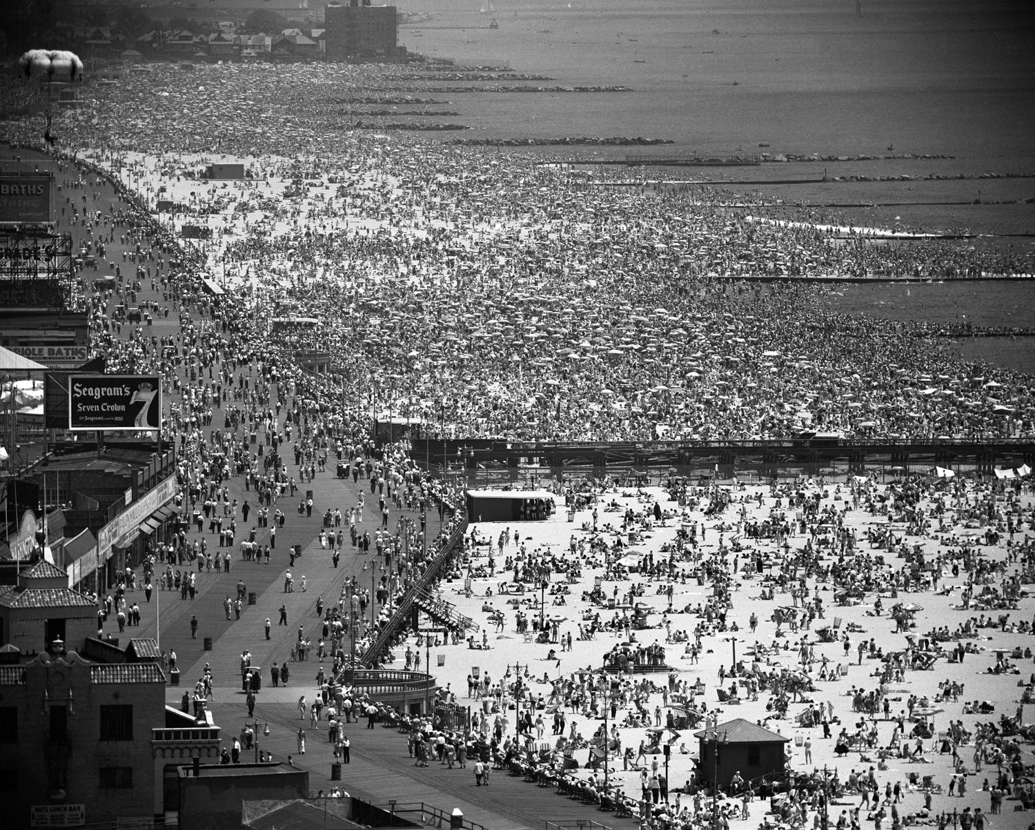 Crowds fill Coney Island's beaches on the Fourth of July, Brooklyn, New York, 1949.