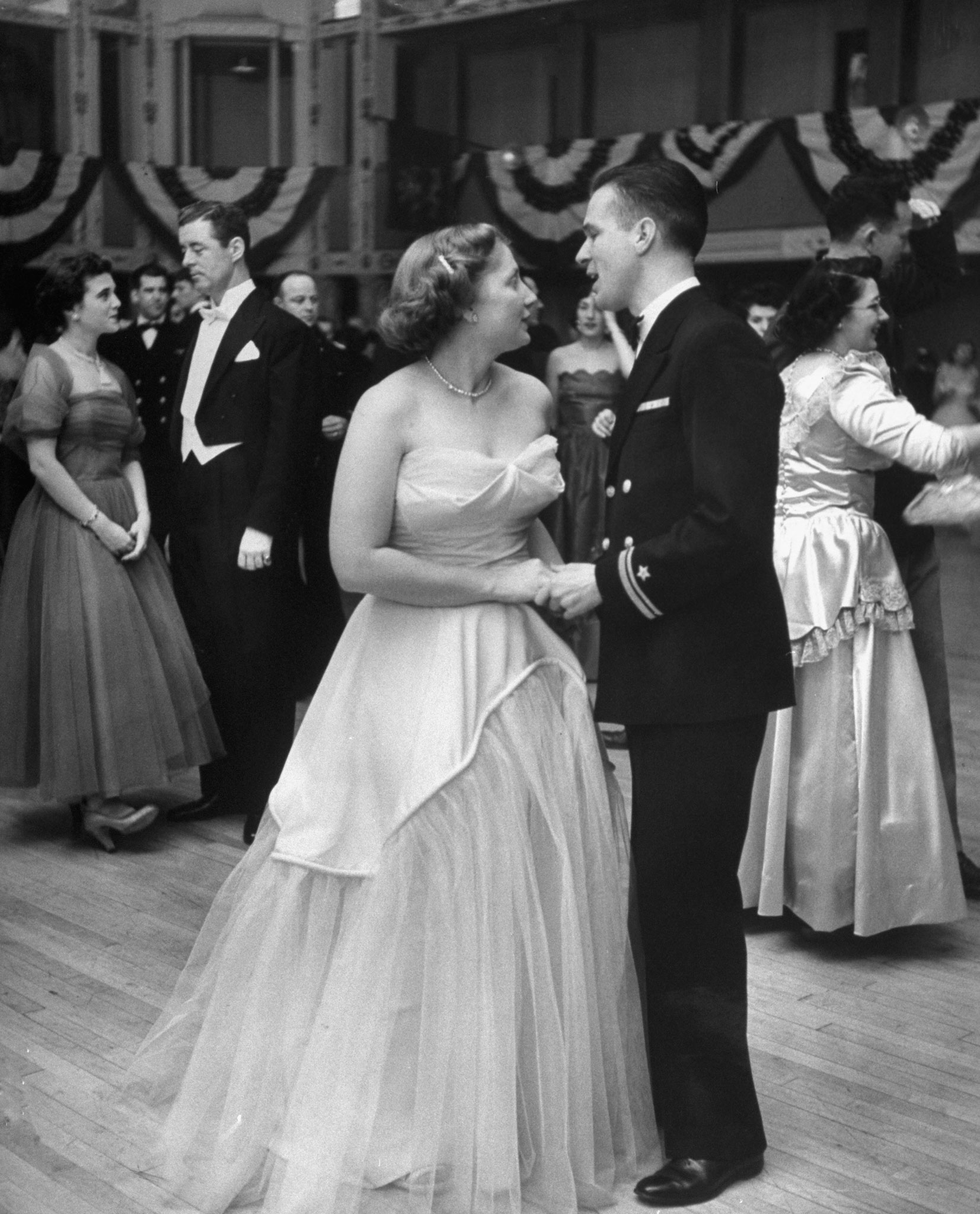 Now down to 155 pounds, an attractive Dorothy dances at Navy Ball