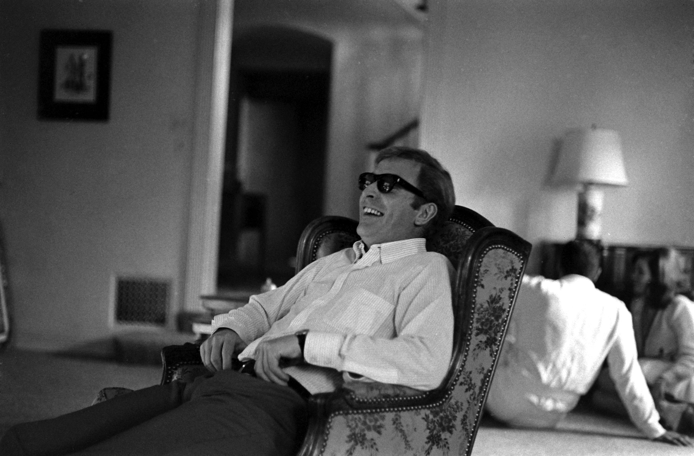 Michael Caine laughing, Los Angeles, 1966.