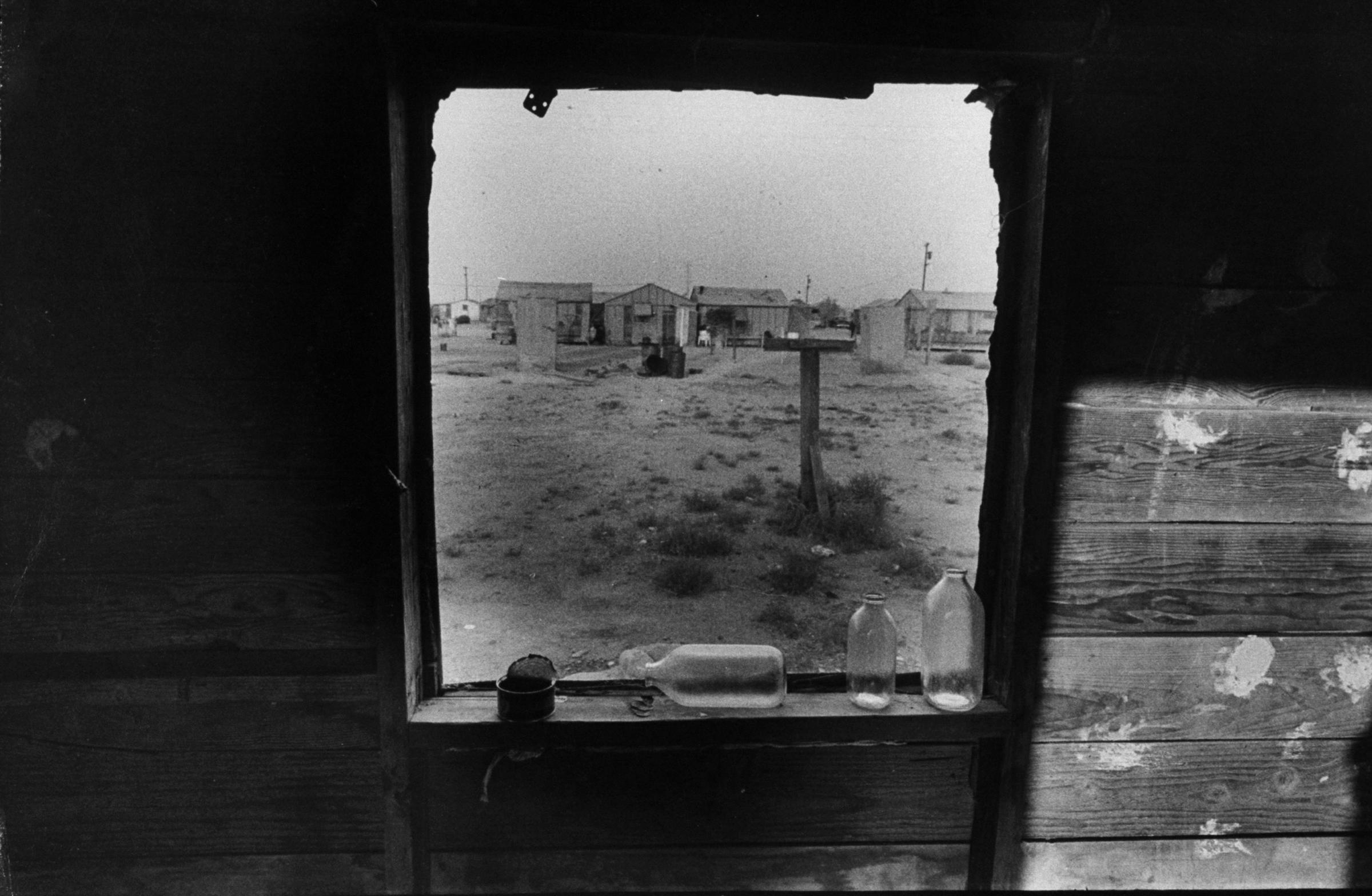 Migratory farm workers and their families living in squalid conditions, California, 1959.