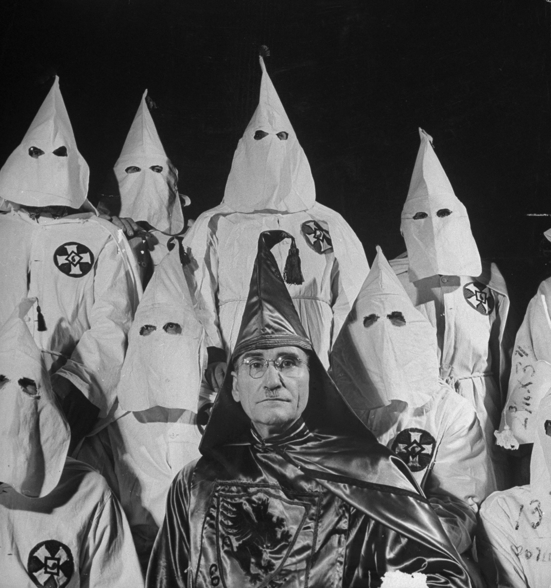 The Grand Dragon of the Fulton County, Ga., Ku Klux Klan, an Atlanta doctor named Samuel Green, surrounded by his assistants, May 1946.