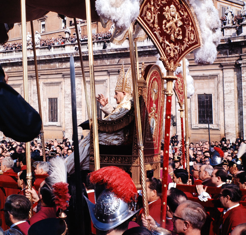 Pope John XXIII rides in procession to St. Peter's Basilica at the Second Vatican Ecumenical Council, 1962.