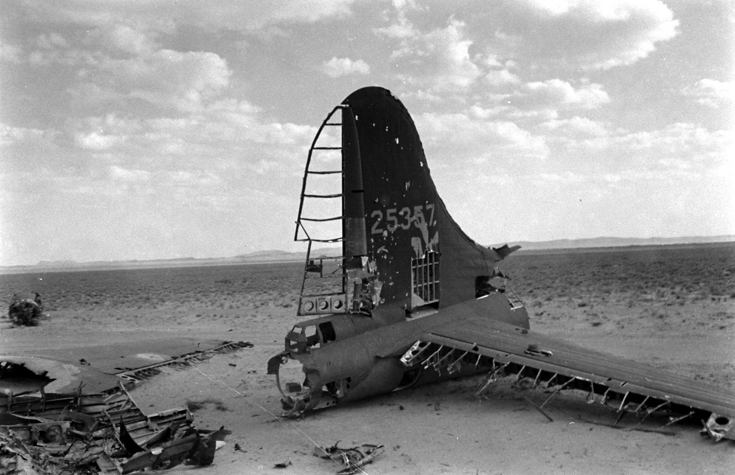 Airplane wreckage in the desert, Tunisia, 1943.