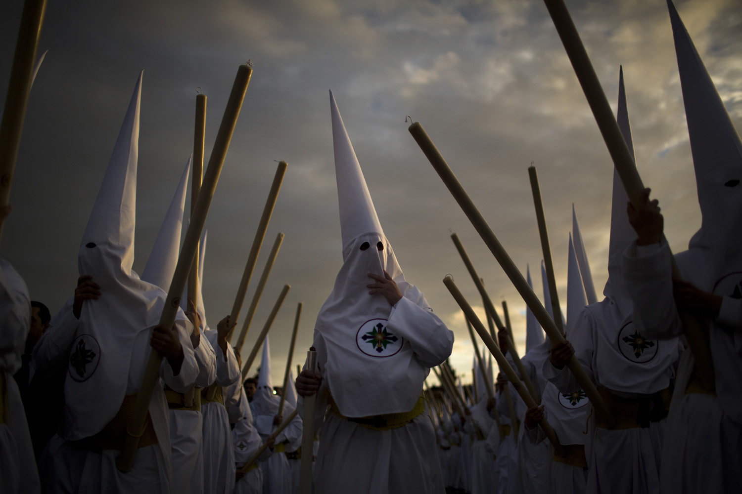 March 25, 2013. Penitents from  San Gonzalo  brotherhood take part in a procession in Seville, Spain. Hundreds of processions take place throughout Spain during the Easter Holy Week.