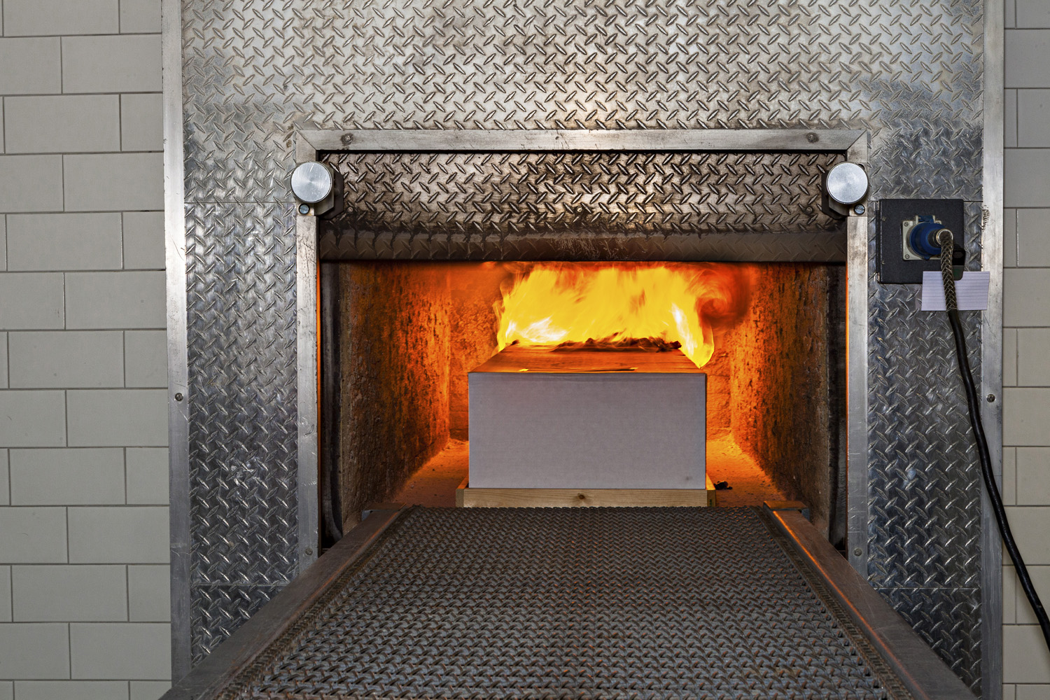 A body in the fire-based crematory oven of Lakewood Cemetery.