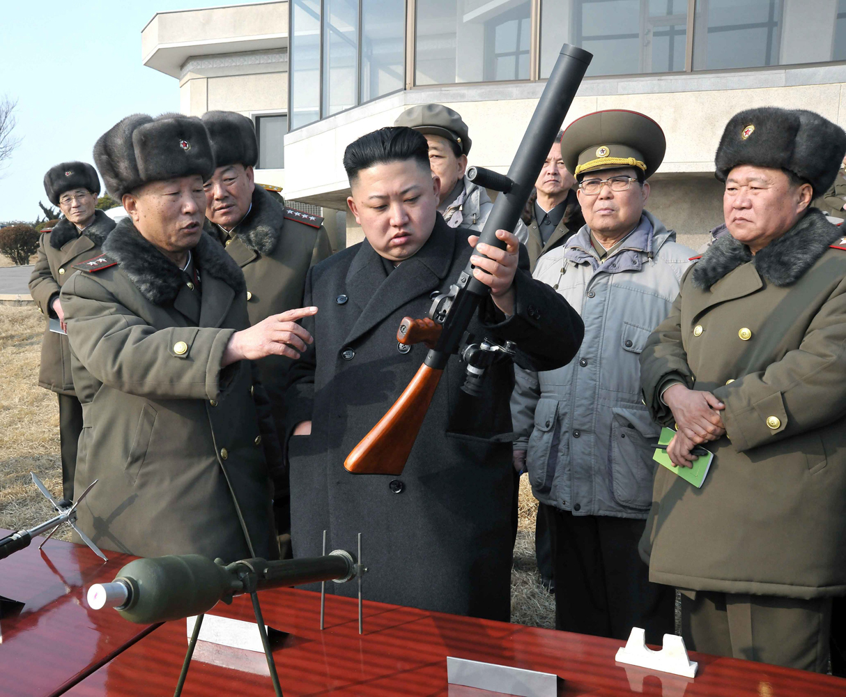 Feb. 26, 2013. North Korean leader Kim Jong-un takes a close look at a gun during an inspection of an artillery firing exercise at an unidentified artillery unit.