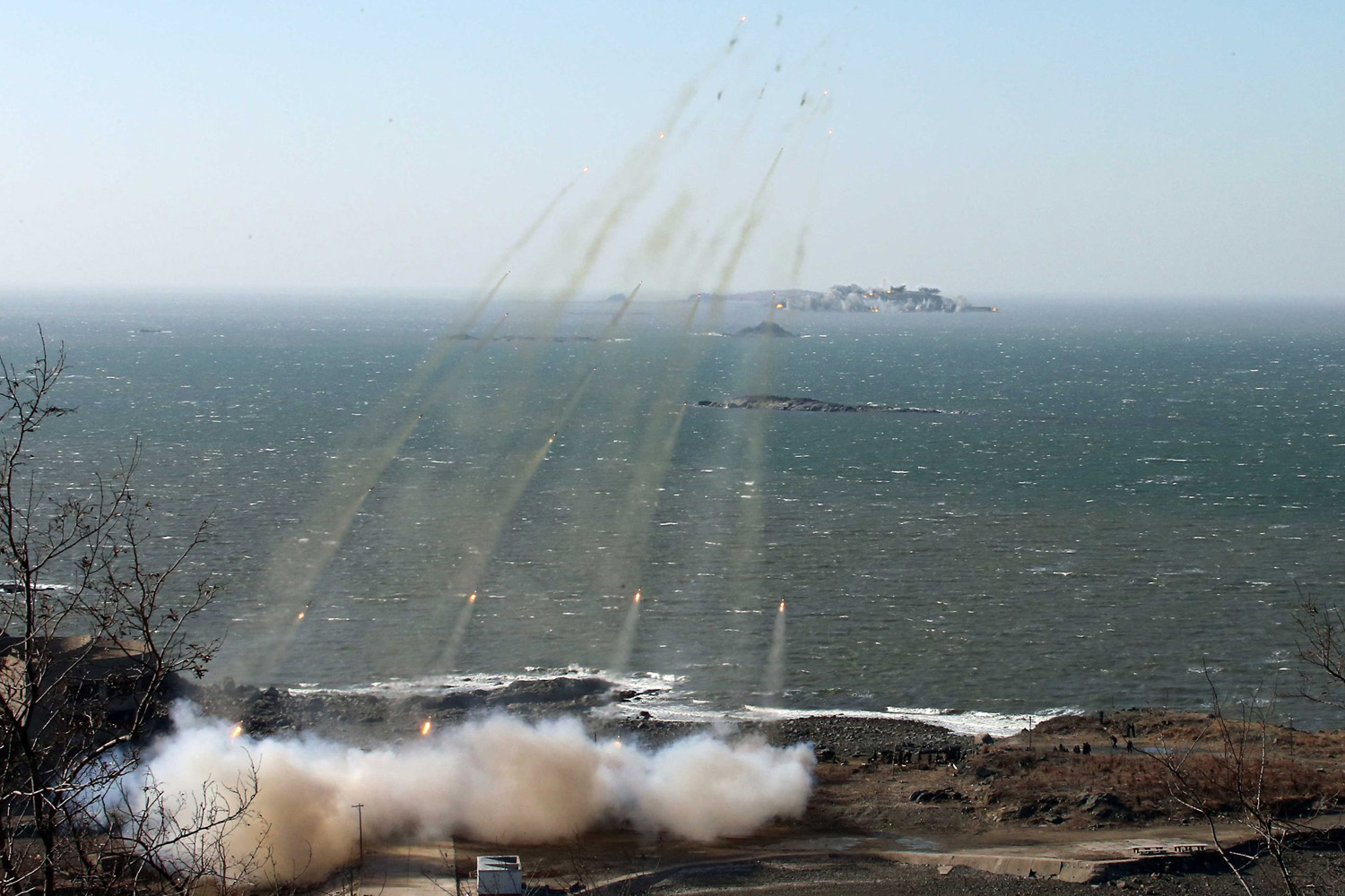 North Korea's artillery sub-units, whose mission is to strike Daeyeonpyeong island and Baengnyeong island of South Korea, conduct a live shell firing drill in the western sector of the front line