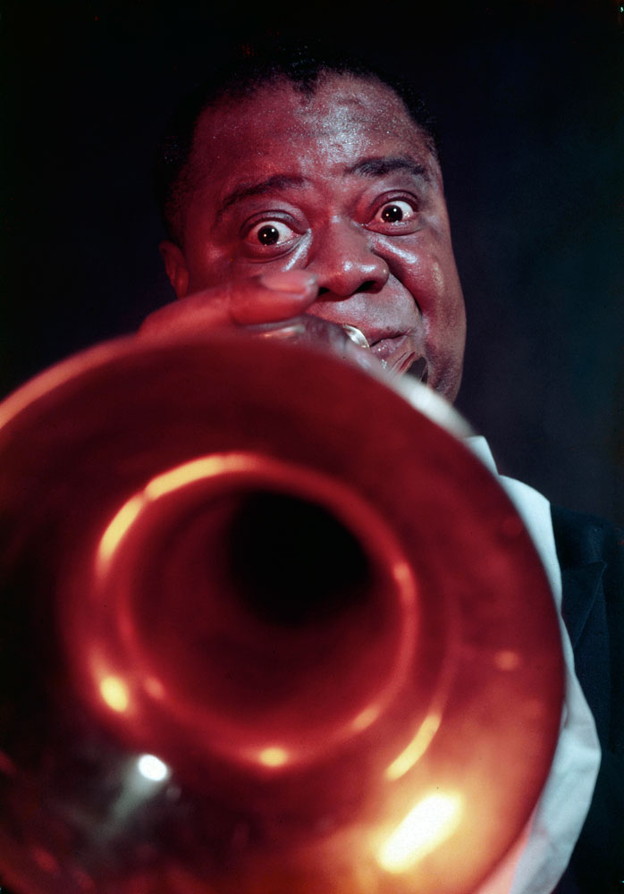 With his trumpet glowing like a hot coal, Louis Armstrong first ripped into jazz in New Orleans 37 years ago .... [He is] a superb musician and a clear spellbinder.