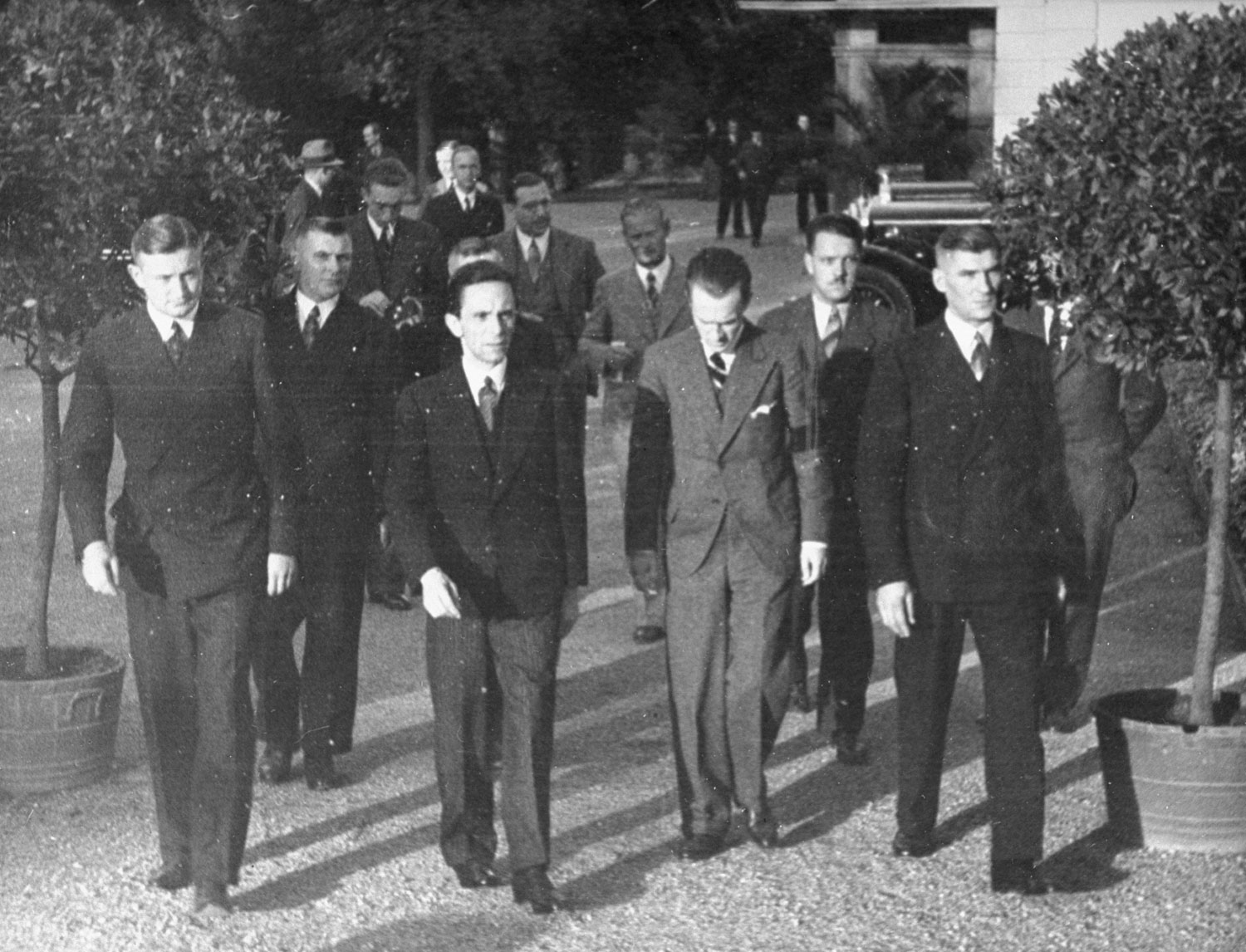 Joseph Goebbels (center) walks with the German delegation at League of Nations conference, Geneva, 1933.