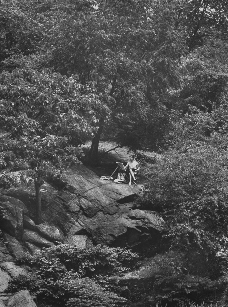 A painter finds a secluded spot, Central Park, 1961.