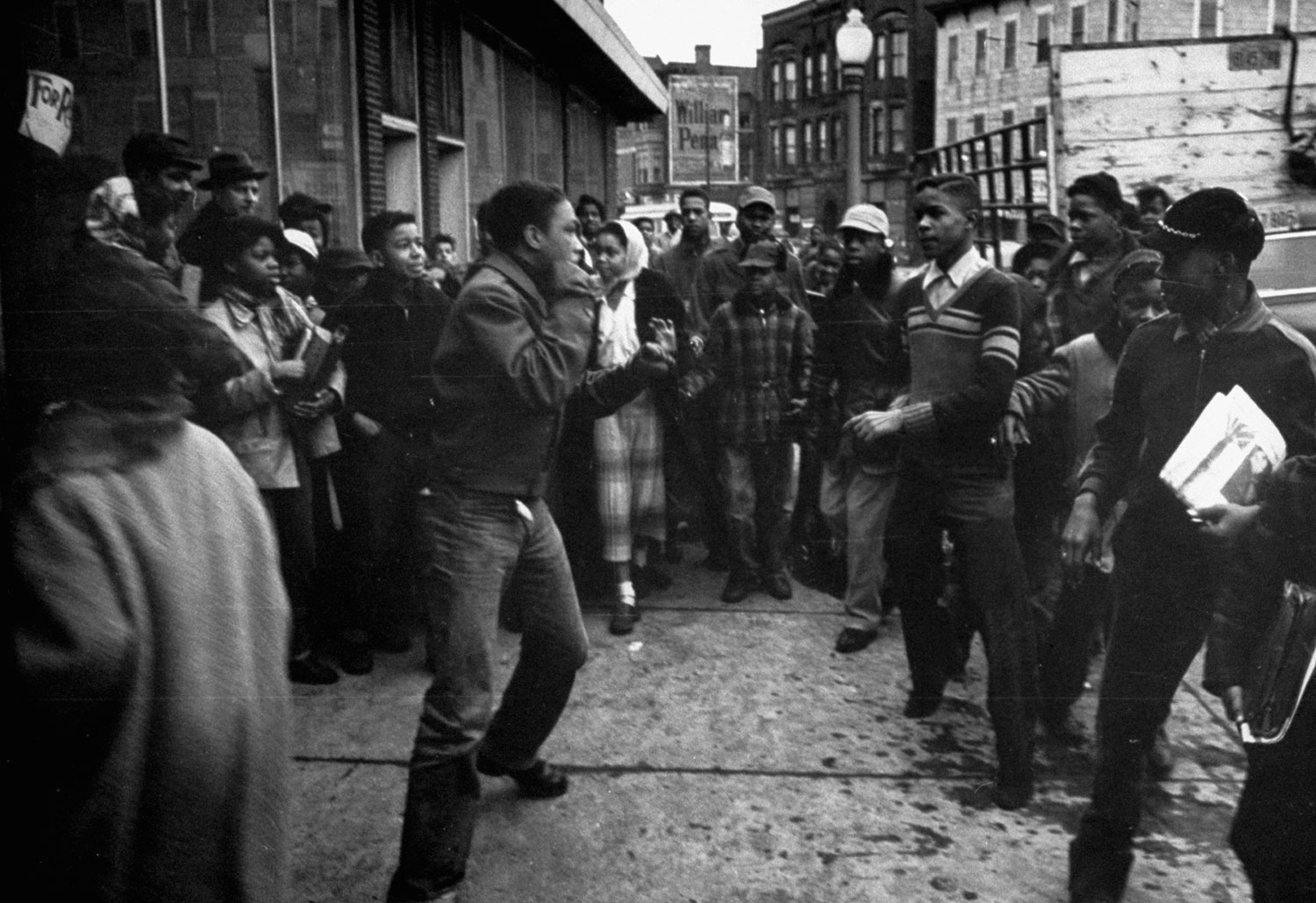 Teenagers fighting in the streets, Chicago, 1954.