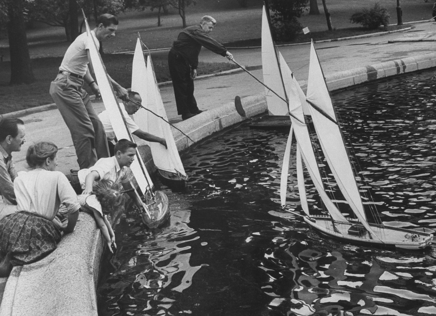 Model sailboats in Conservatory Pond, Central Park, 1961.