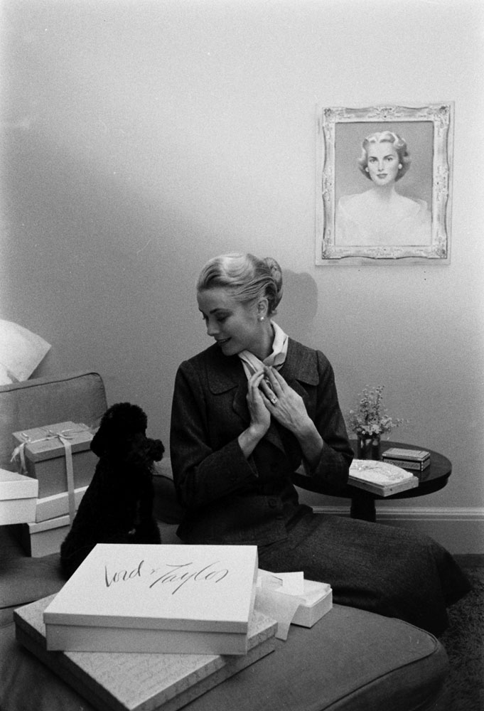 Grace Kelly and her poodle, Oliver, 1956.