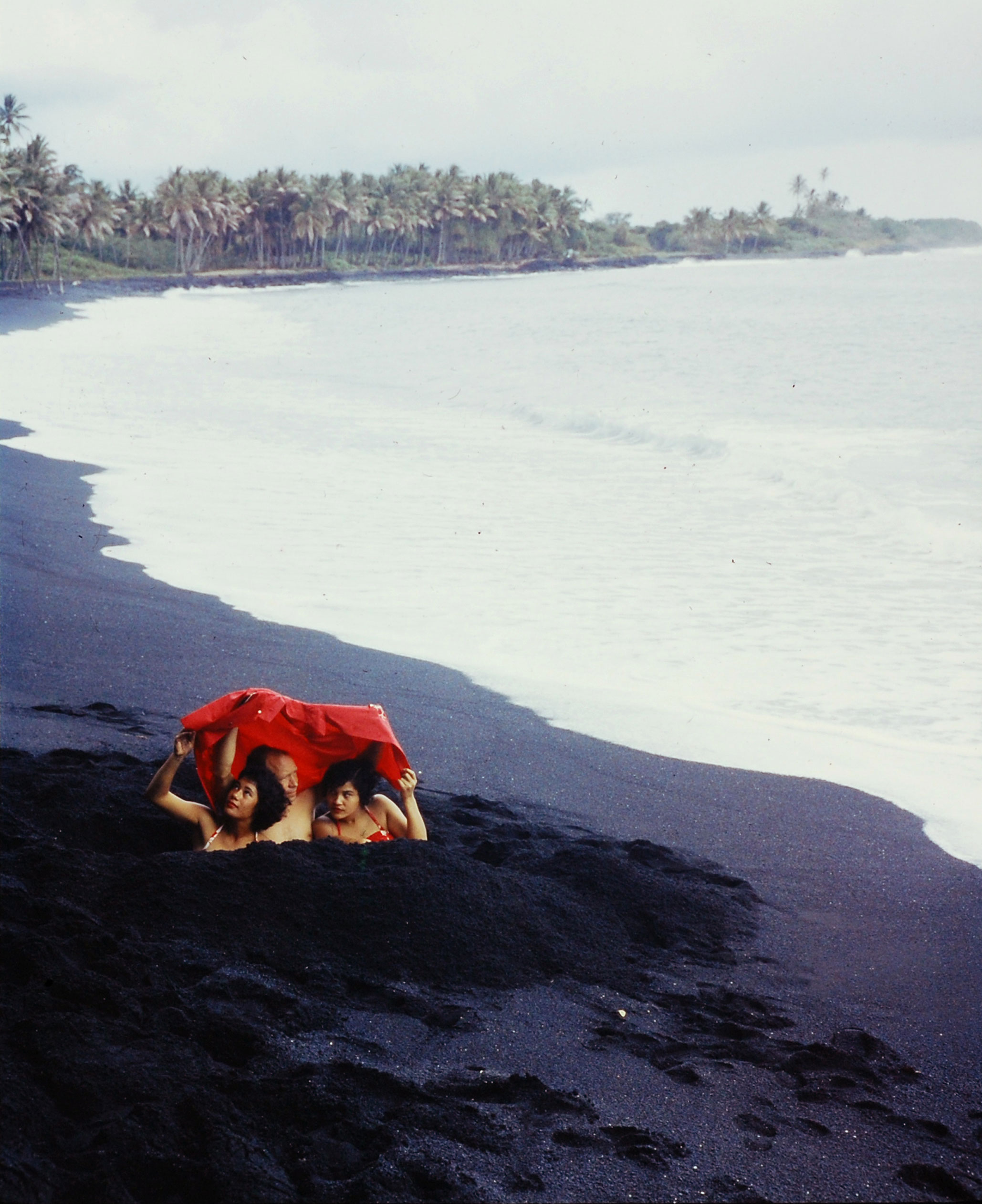 Black-sand beach, made by waves battering volcanic rock, on the Big Island, Hawaii, 1959.