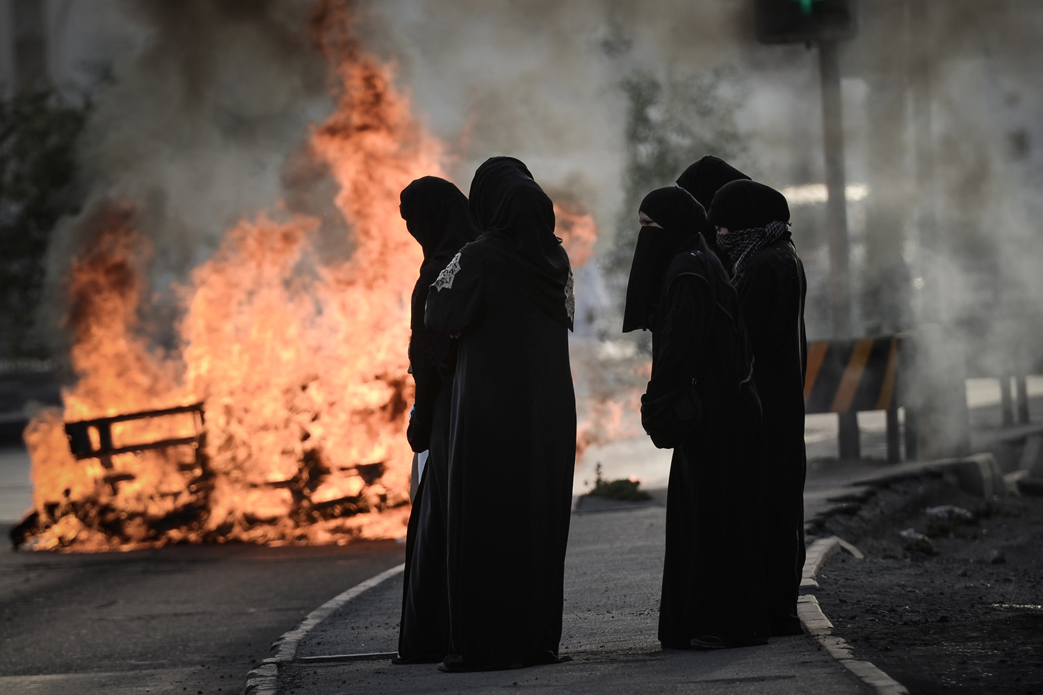 April 15, 2013. Bahraini women shout anti-regime slogans during a rally in support of political activists held in prison in the village of Jidhafs, west of Manama.
