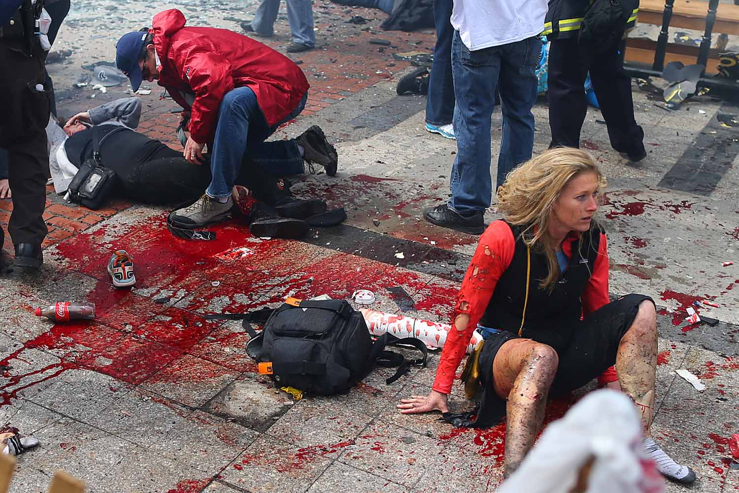 April 15, 2013. Victims are in shock and being treated at the scene of the first explosion that went off near the finish line of the Boston Marathon.