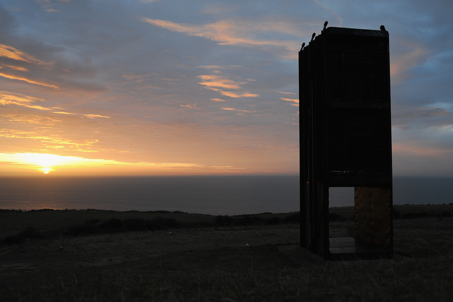 April 17, 2013. The sun rises behind a former pit cage from Easington Colliery, the only reminder on the site of the pit at Easington in England. Former miners and their families held a commemoration party for the closure of the pit at Easington Colliery.