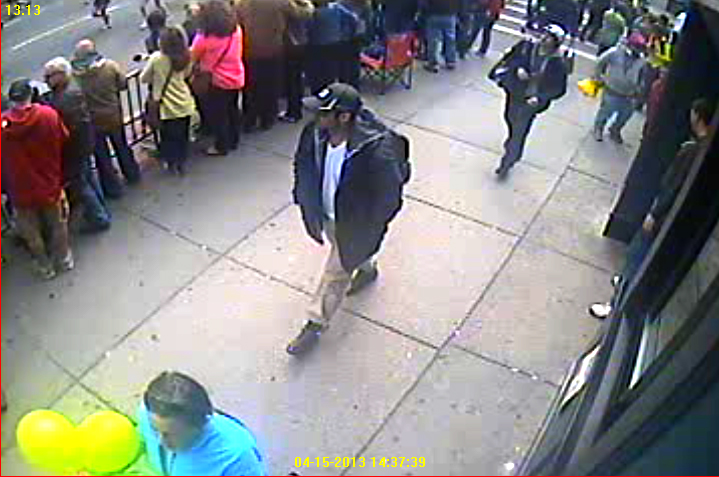 In this image released by the FBI on April 18, 2013, two suspects in the Boston Marathon bombing walk near the marathon finish line on April 15, 2013 in Boston, Massachusetts.