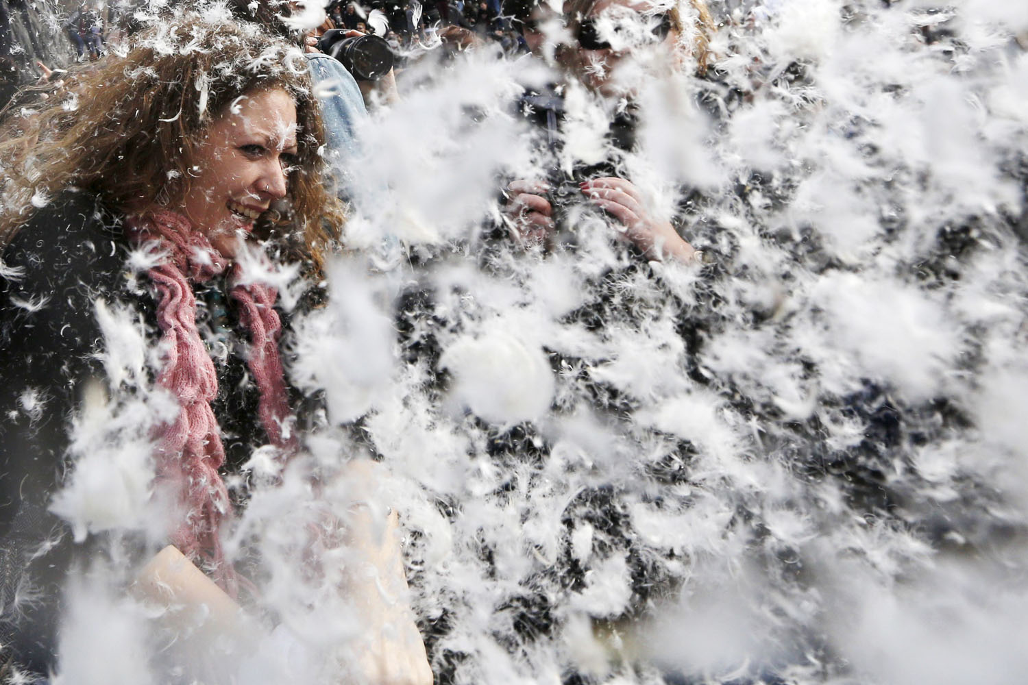 Participants join a mass pillow fight in Trafalgar Square in central London