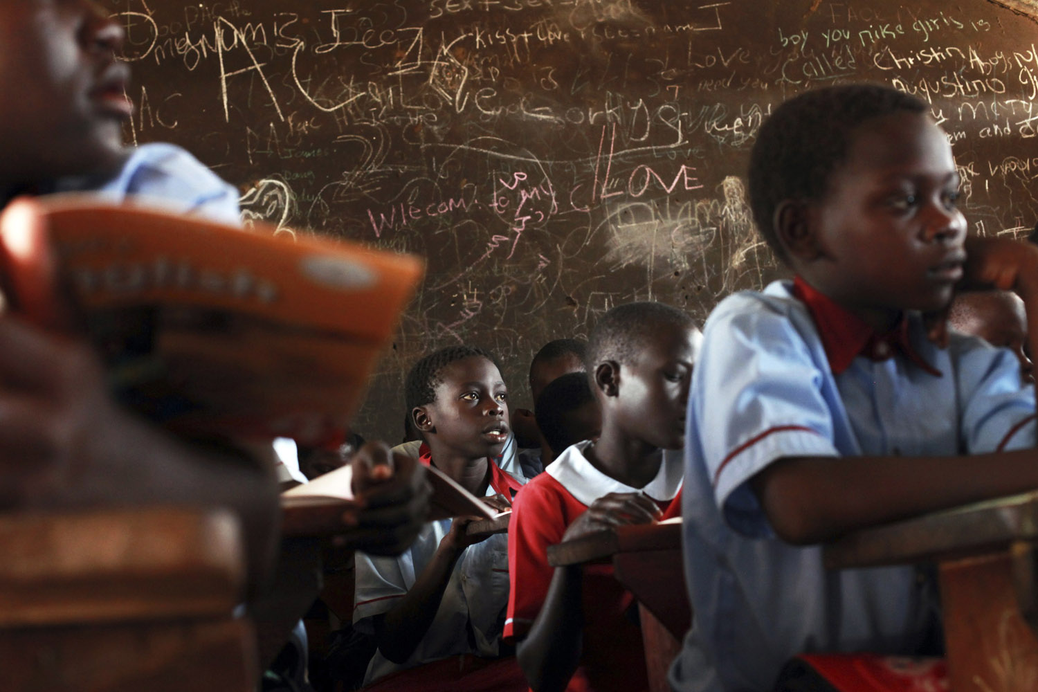 Students attend a lesson at a public school in Gudele, on the outskirts of South Sudan's capital Juba