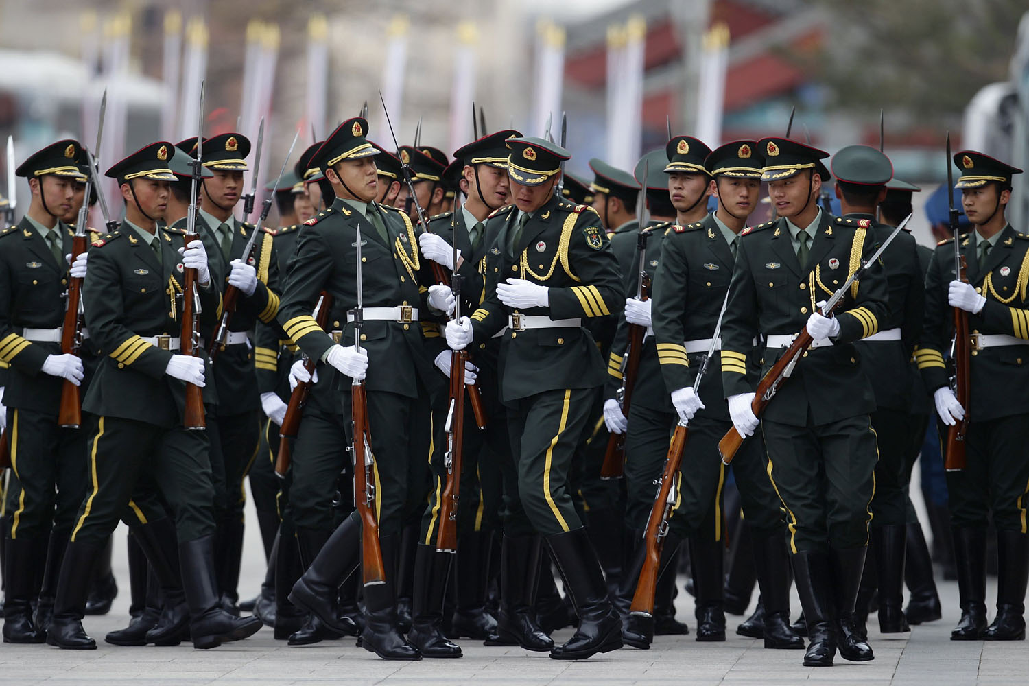 Honour guard troops line up before a welcome ceremony for New Zealand's Prime Minister John Key outside the Great Hall of the People in Beijing