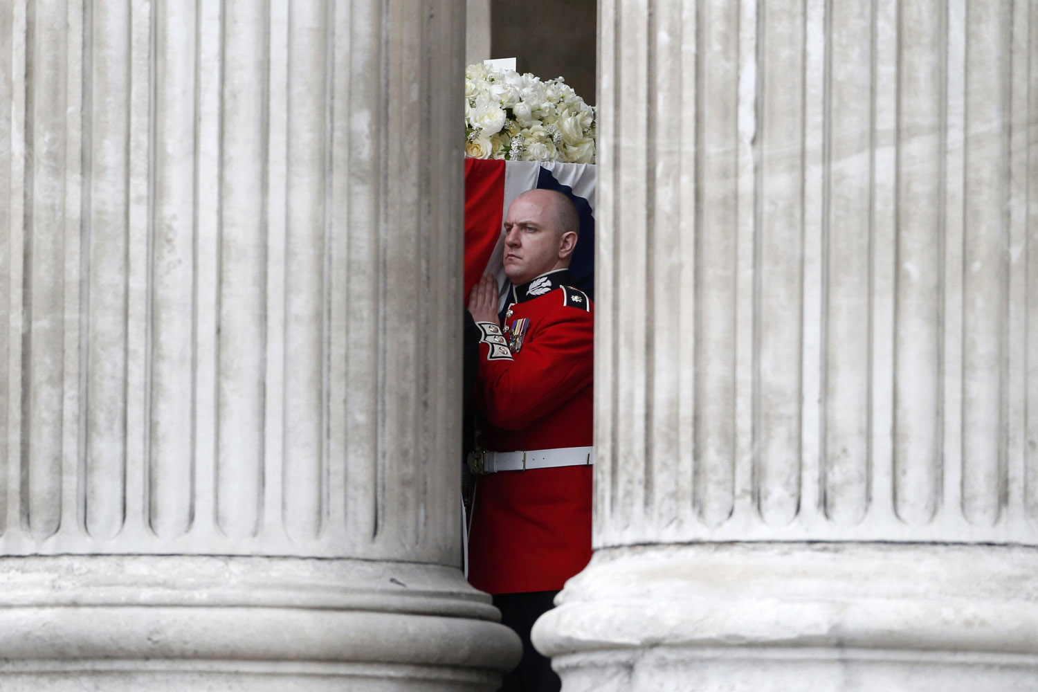 April 17, 2013. The coffin of former British prime minister Margaret Thatcher is carried by the Bearer Party after the funeral service at St Paul's Cathedral in London.