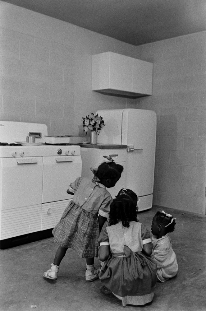 A Chicago family in its new apartment, built by the Chicago Housing Authority, 1954.