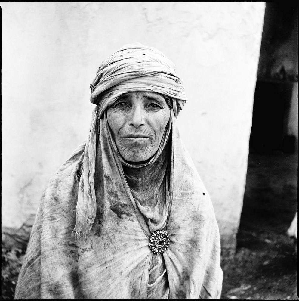A 1960 photograph of an Algerian woman in a French regroupment village.
