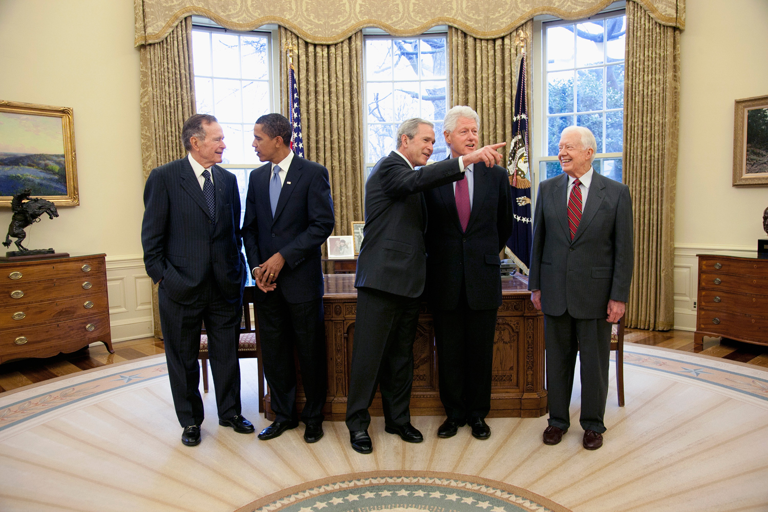 Jan. 7, 2009. President Bush leads a photo opportunity with former presidents Jimmy Carter, George H. W. Bush, Bill Clinton and President-Elect Barack Obama in the Oval Office. The five presidents sat down together for lunch following the meeting.