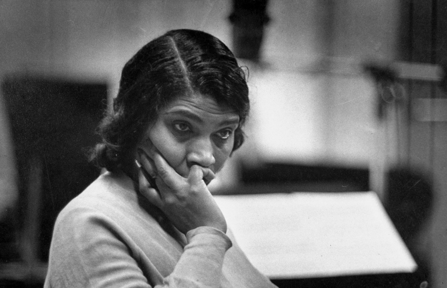 Marian Anderson listens to a recording of Brahms's "Alto Rhapsody," 1947.