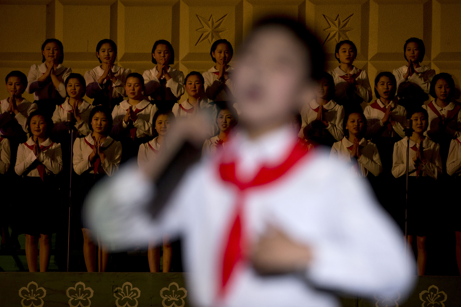 April 18, 2013. North Korean children sing during a performance at Mangyongdae Children's Palace in Pyongyang, North Korea.
