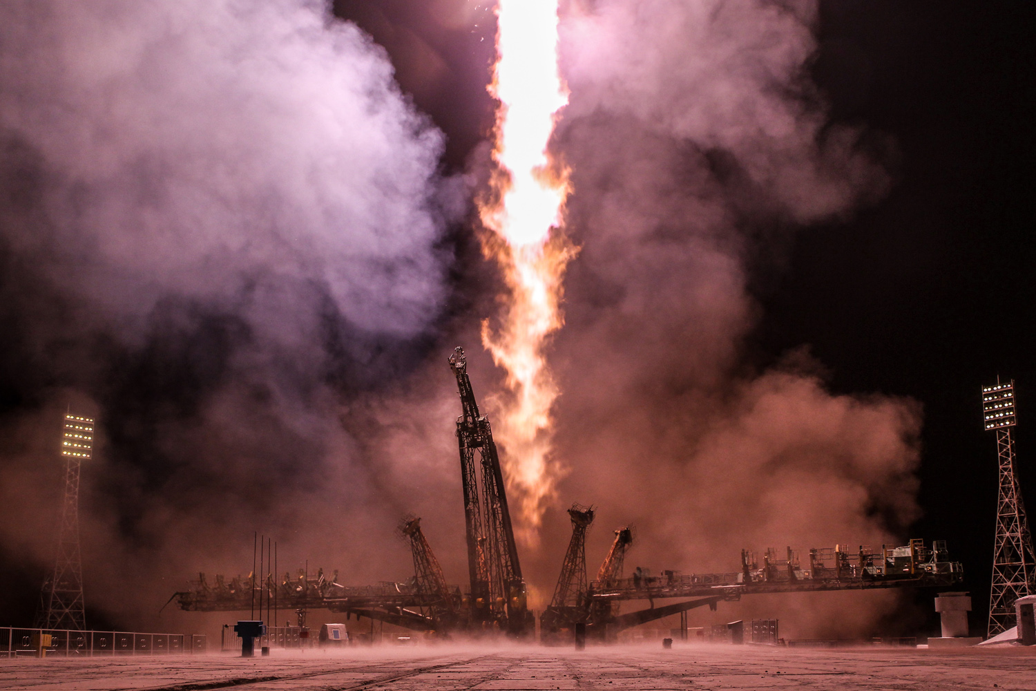 A rocket booster carrying the Soyuz TMA-08M spacecraft take off