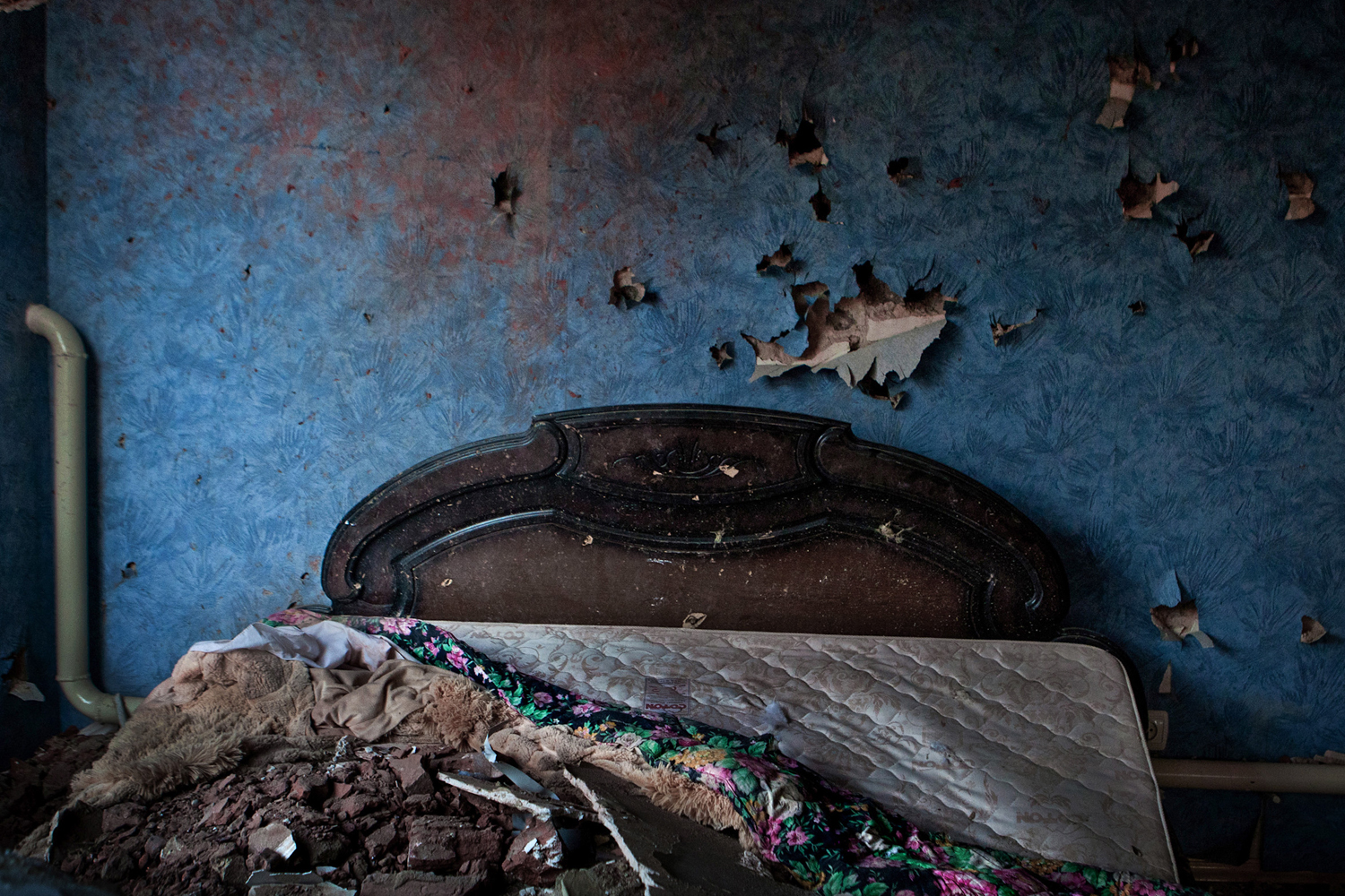 A bed seen in the house after the special forces operation when four people were killed suspected to be insurgents.