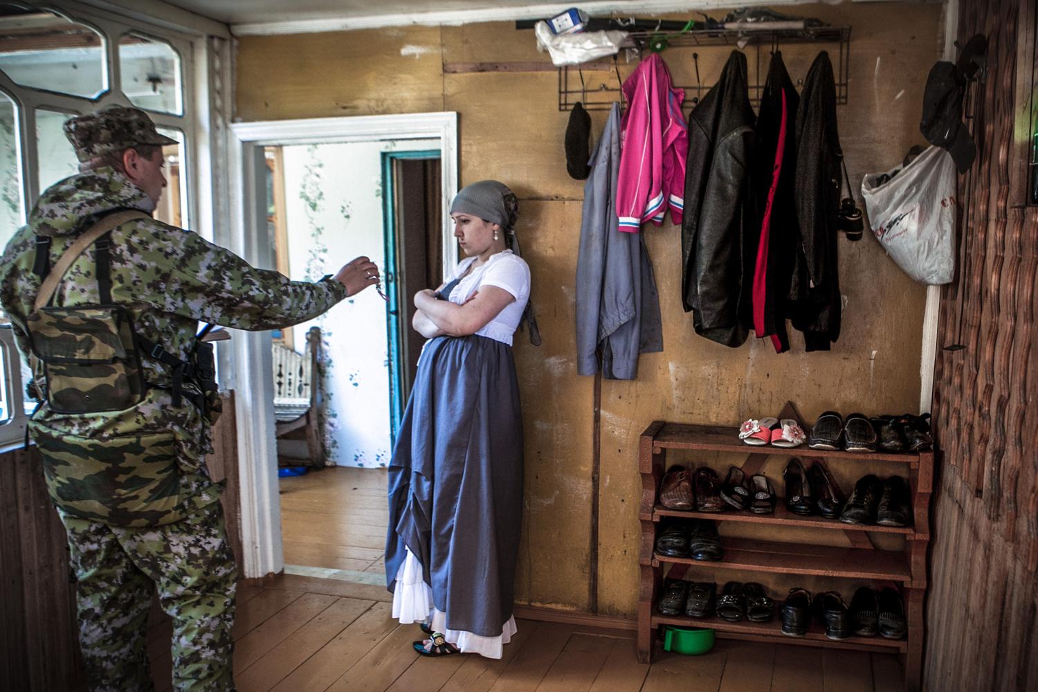 Regular house check held by military forces in the mountain village.