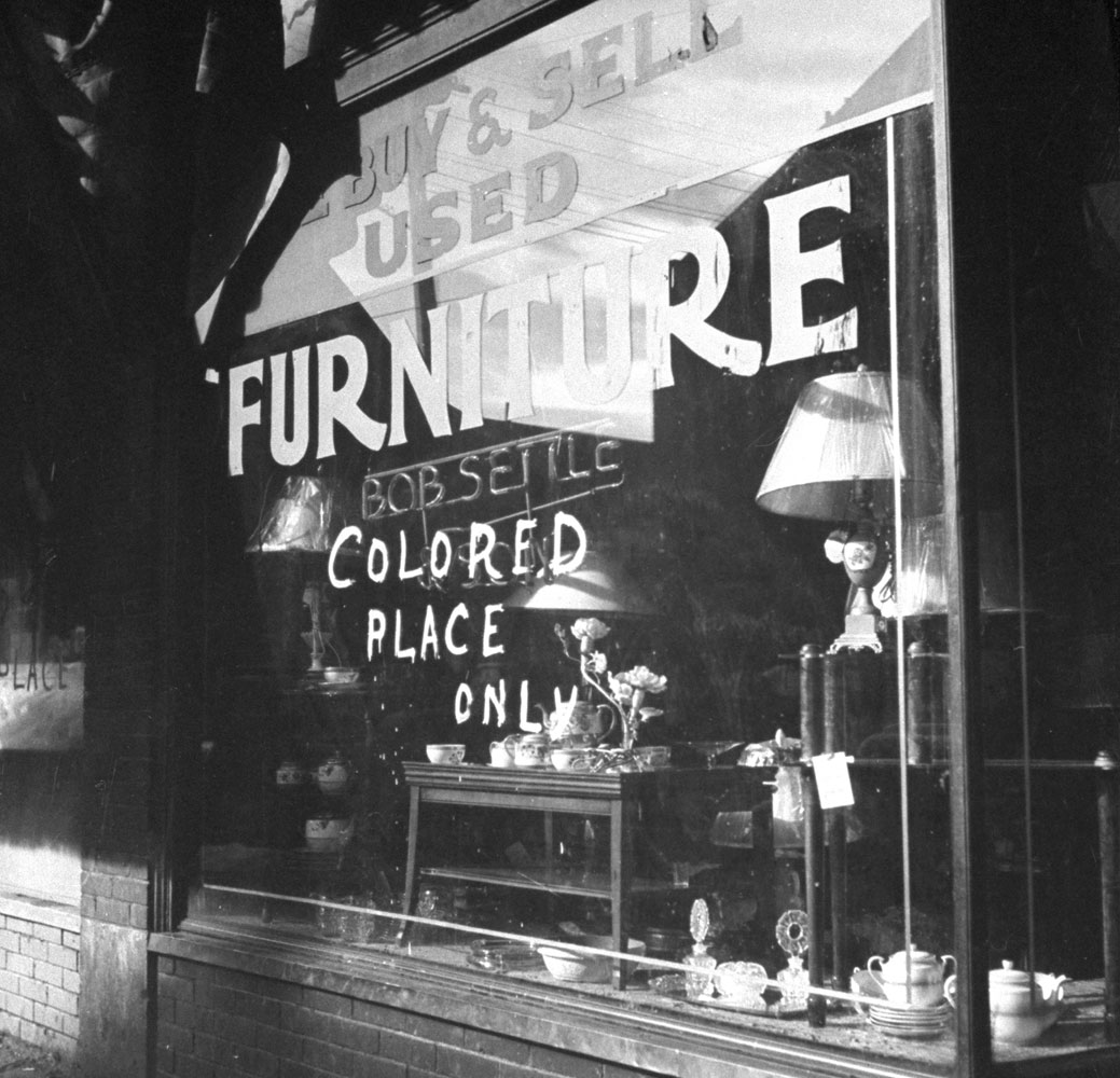 Not published in LIFE. A furniture store in Detroit seen in the aftermath of wartime race riots, June 1943.