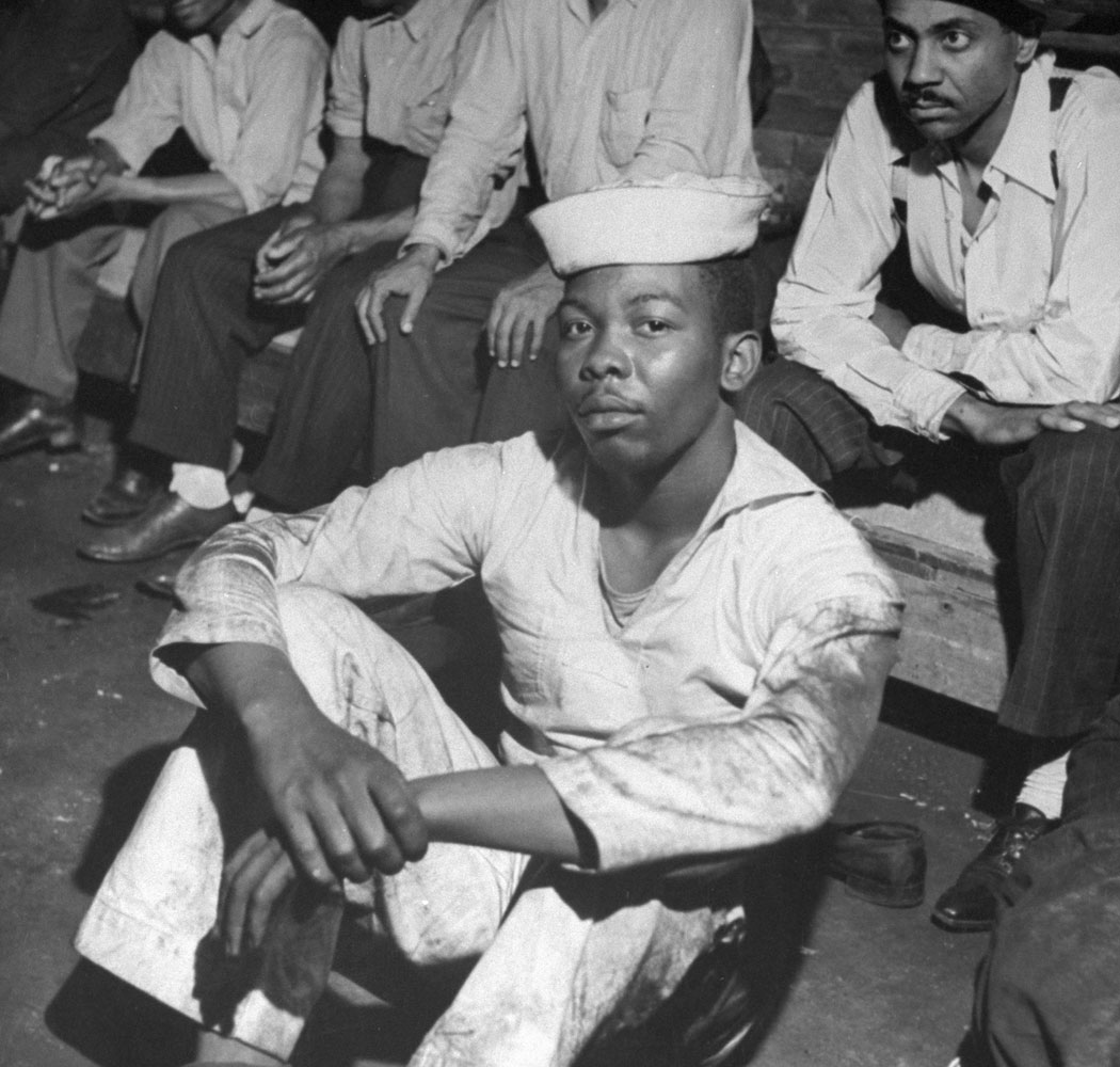 An African American sailor rounded up along with many other black men following wartime race riots in Detroit, June 1943.