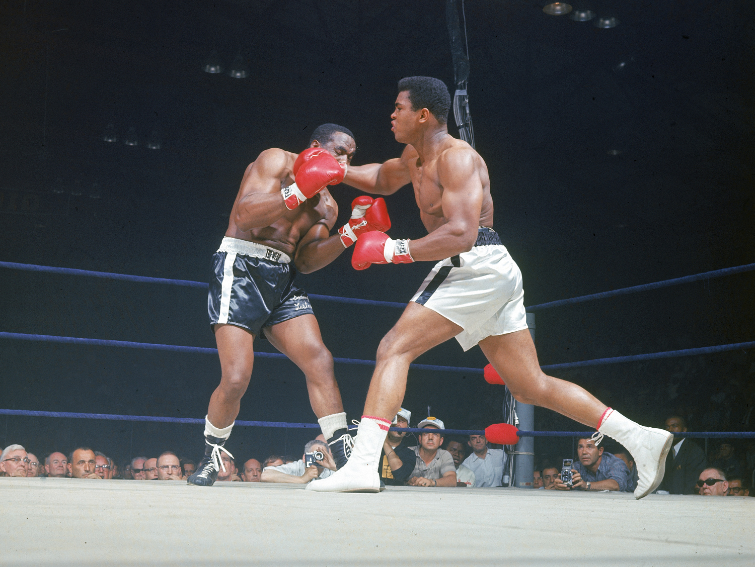 Muhammad Ali rocks Sonny Liston with a right cross, Lewiston, Maine, May 25, 1965.