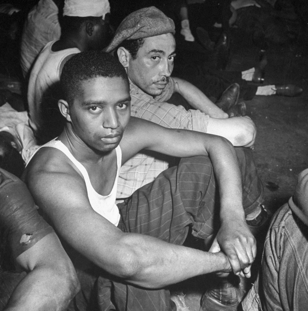 Not published in LIFE. African American men rounded up following wartime race riots in Detroit, June 1943.
