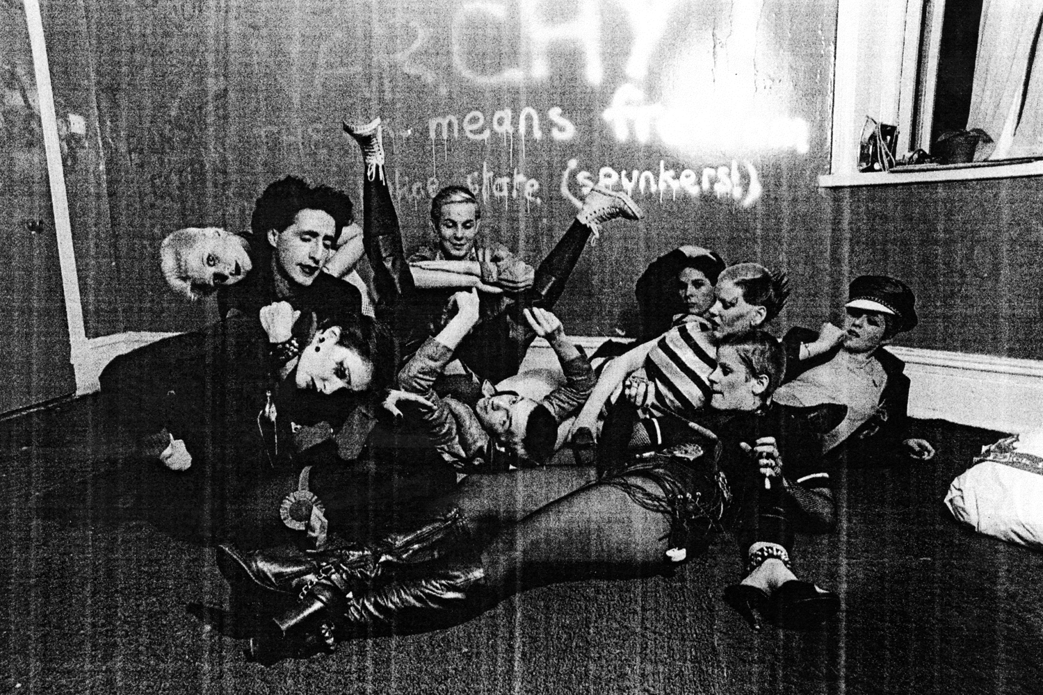 'The Bromley Contingent'—Siouxsie Sioux, Philip Salon, Debbie Juvenile, Simon Barker, Steve Severin, Berlin, Soo Severin, Sharon Hayman and Linda Ashby at Lind a Ashby's flat, London, 1976.