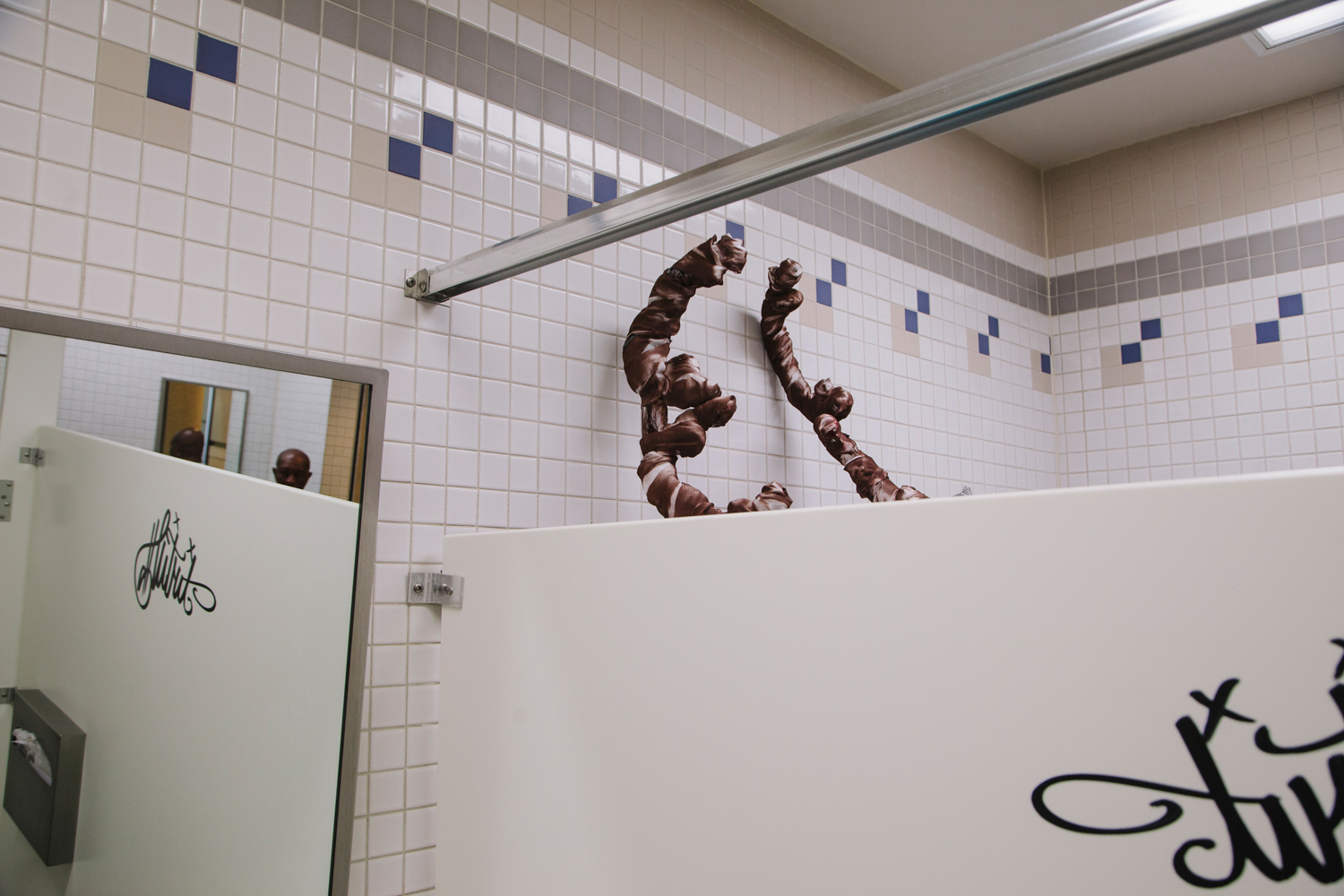 Antlers in the Men's Room, Orlando, FL, 2013, from the project, 'Florida: Eden Isle'.