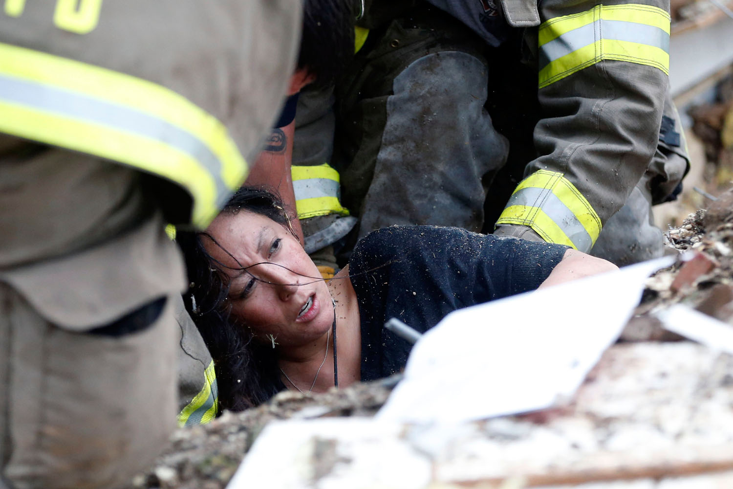 May 20, 2013. A woman is pulled out from under tornado debris at the Plaza Towers School.