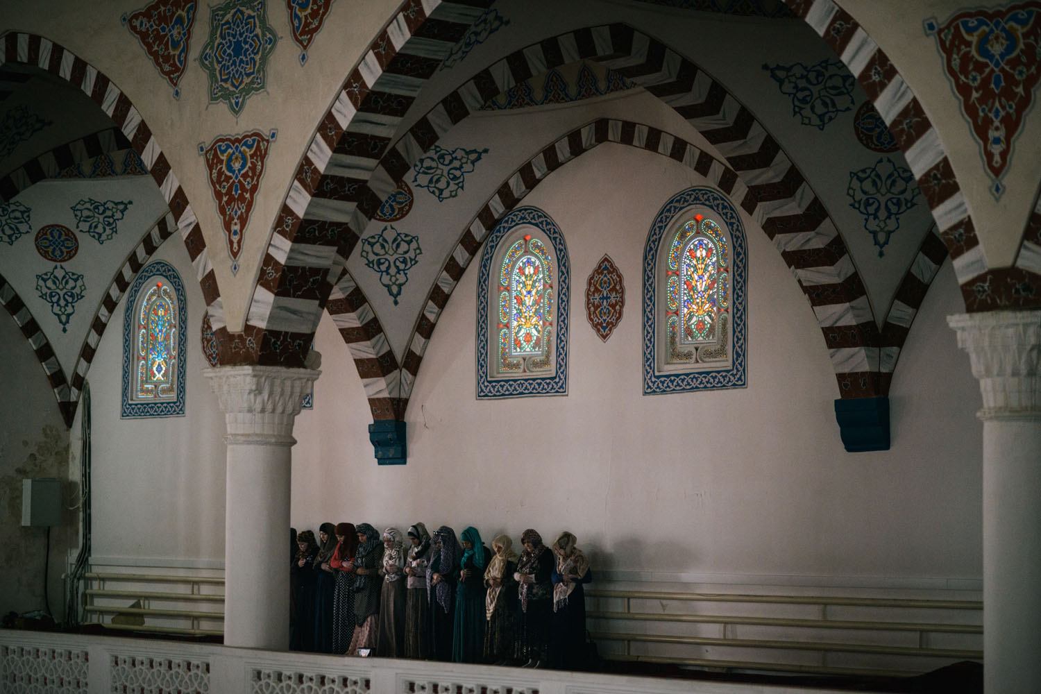 Women pray in main mosque of Dagestan in Makhachkala on May 14, 2013.