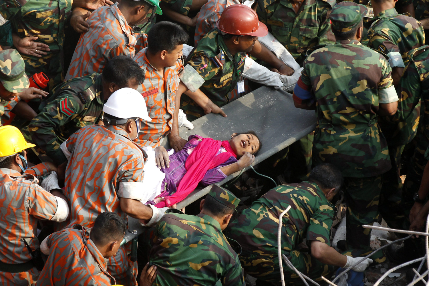 Woman trapped 16 days under collapsed building rescued