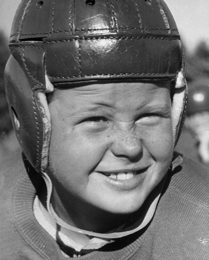 Alex Lindsay Jr., 10, member of the Young America League, who plays football for the Wolf Pack Club, 1939.