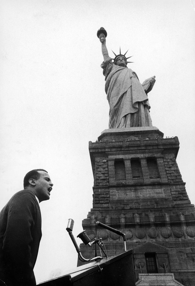 Harry Belafonte speaks at a civil rights rally at the Statue of Liberty, 1960.