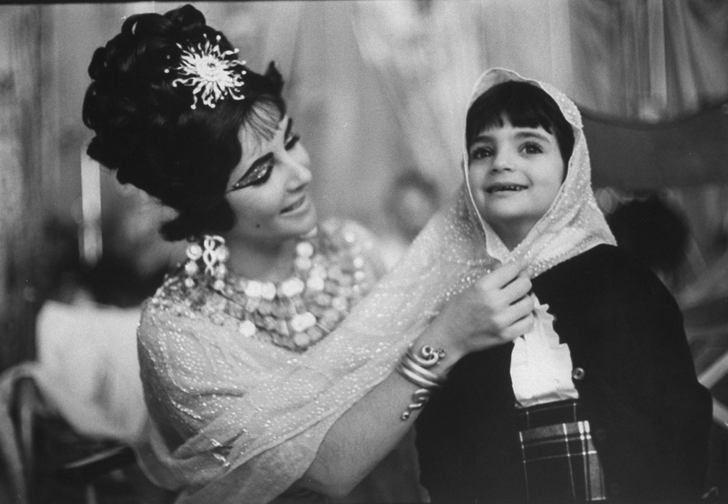 Elizabeth Taylor, with daughter Liza, on the set of 'Cleopatra,' Rome, 1962.