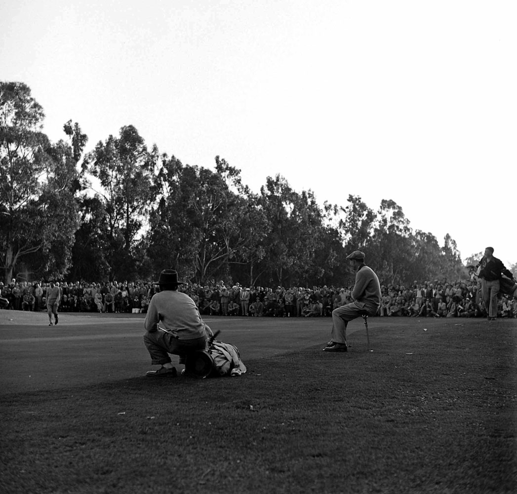 Ben Hogan watches a rival putt, Los Angeles Open, Riviera Country Club, January 1950.