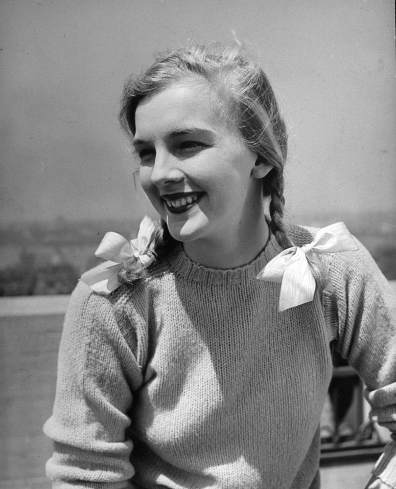 Smith College coed Ann Teal wearing her hair in pigtails, 1941.